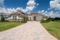 A rare find, 1 year old popular Egret model on over a  1/2  acre for sale in Dade City Florida Pasco County County on GolfHomes.com
