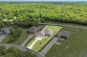 Welcome to this stunning custom-built home tucked inside the for sale in Gainesville Texas Cooke County County on GolfHomes.com