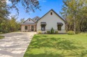 This gorgeous single-story home offers 2,585 sq. ft. of refined for sale in Whitney Texas Hill County County on GolfHomes.com