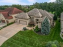 Experience luxury living in this stunning Reverse 1.5 story Don for sale in Lenexa Kansas Johnson County County on GolfHomes.com