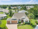 Welcome Home!! BOND PAID -- GOLF CART GARAGE -- ROOF 2019 -- for sale in The Villages Florida Sumter County County on GolfHomes.com