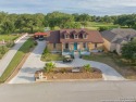 Stunning 2,395 sq feet, 4 Bedroom, 2 Bath with an office on the for sale in Devine Texas Medina County County on GolfHomes.com