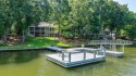 Discover timeless Southern elegance and luxury lakefront living for sale in Eatonton Georgia Putnam County County on GolfHomes.com