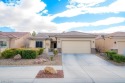 Located in the serene Sun City Aliante 55+ community, this for sale in North Las Vegas Nevada Clark County County on GolfHomes.com