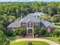 Discover this beautiful 5-bedroom, 5-bath single-family home for sale in Gulf Breeze Florida Santa Rosa County County on GolfHomes.com