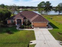 Spectacular Nadeau custom-built home with private spring-fed for sale in Ocala Florida Marion County County on GolfHomes.com