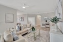 Welcome to this stunning move-in ready first-floor coach home for sale in Naples Florida Collier County County on GolfHomes.com