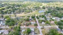 Located in FOREST HILLS, this charming Mid-Century home sits on for sale in Tampa Florida Hillsborough County County on GolfHomes.com