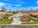 Step into luxury desert living with this upgraded 4-bedroom for sale in Indio California Riverside County County on GolfHomes.com