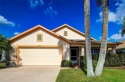 NEW PRICE!  Do not miss this lovely 4 bedroom/2bath/2car garage for sale in Land O Lakes Florida Pasco County County on GolfHomes.com