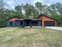 This modern home is not your average build! Featuring an for sale in Bella Vista Arkansas Benton County County on GolfHomes.com