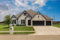 Experience refined living in this beautifully maintained for sale in Gunter Texas Grayson County County on GolfHomes.com