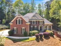 Absolutely stunning home now available in coveted Towne Lake for sale in Woodstock Georgia Cherokee County County on GolfHomes.com