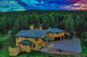 This meticulously designed luxury estate sits on 40 acres of for sale in Woodland Park Colorado Teller County County on GolfHomes.com