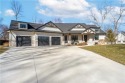 Nestled on 1.2 acres of wooded property this home is IMPRESSIVE! for sale in Johnston Iowa Polk County County on GolfHomes.com