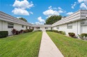 **MOVE IN READY VILLA with CANAL VIEWS** Affordable condo for sale in Delray Beach Florida Palm Beach County County on GolfHomes.com