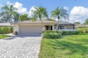 Much sought after Pine Tree Villa on large lot with private pool for sale in Boynton Beach Florida Palm Beach County County on GolfHomes.com