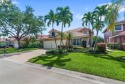 This gorgeous two-story Waterfront home has an Open Floor Plan for sale in Coral Springs Florida Broward County County on GolfHomes.com