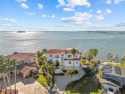 Boasting almost 200 feet of direct, panoramic Gulf frontage for sale in Dunedin Florida Pinellas County County on GolfHomes.com