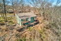 Nestled on .62 acres, this fully updated property offers an for sale in Bella Vista Arkansas Benton County County on GolfHomes.com