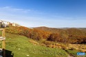 This top-floor, end-unit condo offers stunning year-round for sale in Wintergreen Virginia Nelson County County on GolfHomes.com