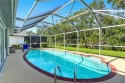 Nestled in the sought-after gated community of Sabal Springs for sale in North Fort Myers Florida Lee County County on GolfHomes.com