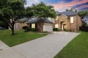 Enjoy your morning coffee on the covered patio while taking in for sale in Plano Texas Collin County County on GolfHomes.com