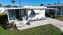 This 2-bedroom, 2-bathroom turnkey furnished mobile home in the for sale in Bradenton Florida Manatee County County on GolfHomes.com