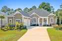 Welcome to this stunning custom-built Whitney Blair home in the for sale in Sunset Beach North Carolina Brunswick County County on GolfHomes.com