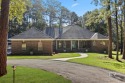 This serene private getaway offers nearly 3 acres of privacy and for sale in Daphne Alabama Baldwin County County on GolfHomes.com