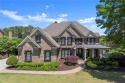 Truly one-of-a-kind, this exquisitely updated residence offers for sale in Canton Georgia Cherokee County County on GolfHomes.com