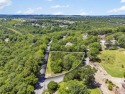 Wonderful .37 acre corner lot in Holiday Hills! This gated for sale in Branson Missouri Taney County County on GolfHomes.com