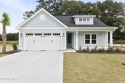 Welcome to beach life in this adorable, easy to live in home for sale in Ocean Isle Beach North Carolina Brunswick County County on GolfHomes.com