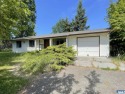 Calling all investors! Amazing opportunity to transform this for sale in Sequim Washington Clallam County County on GolfHomes.com