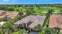 Nestled on a picturesque street within a coveted golf course for sale in West Palm Beach Florida Palm Beach County County on GolfHomes.com