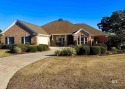 Charming 3-bedroom, 2.5-bathroom custom built home nestled in for sale in Gulf Shores Alabama Baldwin County County on GolfHomes.com