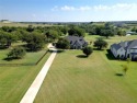 Executive living at it's best in the premier gated Canyon West for sale in Weatherford Texas Parker County County on GolfHomes.com