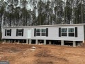 Brand new 3 bedroom 2 bath manufactured home on 1.25 acre lot! for sale in Canon Georgia Franklin County County on GolfHomes.com