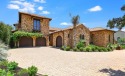 This Tuscan-inspired home backs to the 11th fairway of for sale in Horseshoe Bay Texas Llano County County on GolfHomes.com