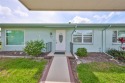 Located on a quiet cul-de-sac and just steps from the covered for sale in Sun City Center Florida Hillsborough County County on GolfHomes.com