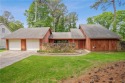 This charming Mid-Century home in Lithonia's Saddlewood for sale in Lithonia Georgia De Kalb County County on GolfHomes.com