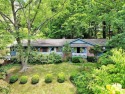 Looking for charm, VIEWS, & a fabulous location?  One Level for sale in Waynesville North Carolina Haywood County County on GolfHomes.com