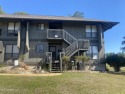 Corner unit in Lanai Village -  You can enjoy your morning for sale in Diamondhead Mississippi Hancock County County on GolfHomes.com