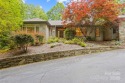 Stunning home situated on 1.48 private acres in highly desirable for sale in Flat Rock North Carolina Henderson County County on GolfHomes.com