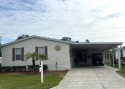 This home is located within a 55+ resort style leased land for sale in Lakeland Florida Polk County County on GolfHomes.com