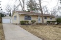 This wonderfully kept single family home sits on a tree-lined for sale in Madison Wisconsin Dane County County on GolfHomes.com