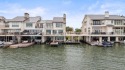 Breathtaking lake views await in this East-Facing townhome with for sale in Horseshoe Bay Texas Llano County County on GolfHomes.com