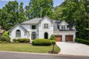 Fabulous retreat located in the heart of Towne Lake that offers for sale in Woodstock Georgia Cherokee County County on GolfHomes.com