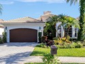Nestled in the RARELY available Sand Cay community, this lovely for sale in West Palm Beach Florida Palm Beach County County on GolfHomes.com