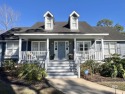 This Creole-Style home is the definition of Southern Charm! for sale in Gulf Shores Alabama Baldwin County County on GolfHomes.com